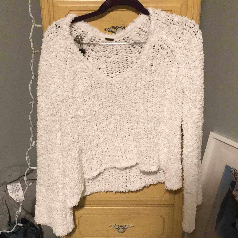 Free people white sweater fits small/medium